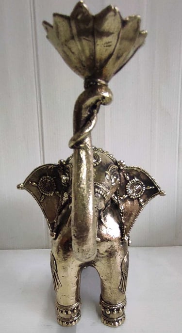 "Handcrafted brass elephant holding lotus flower in raised trunk, front side-Export-grade"