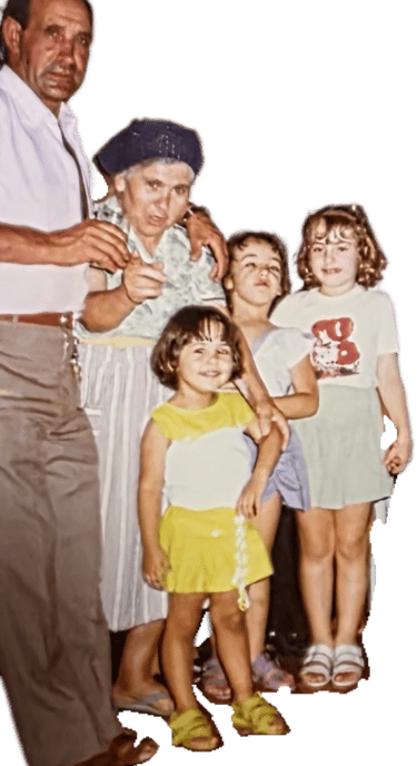 a man and two children posing for a family photo