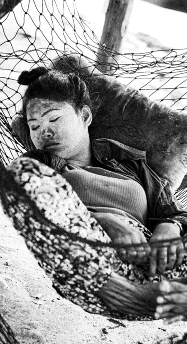 Bajau Laut, Sabah. Woman sleeping in a hammock