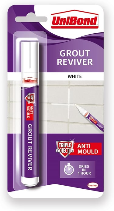 a white toothbrush and a toothbrush in a package