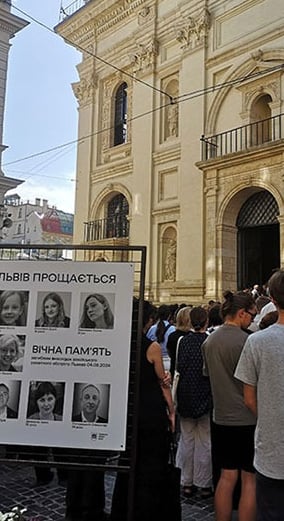 picture from the funeral of a mother and her 3 daughters