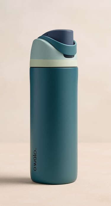 Teal reusable water bottle with flip-top lid on a beige background.