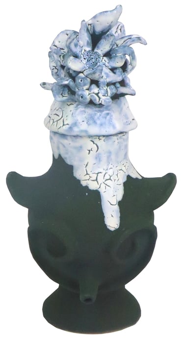 a vase with a flower on it