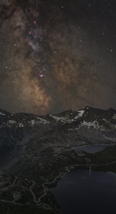 a mountain scene with a lake and a milky - like sky