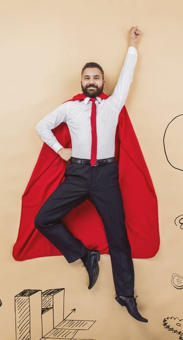  Homme en costume portant une cape rouge qui fait le super heros