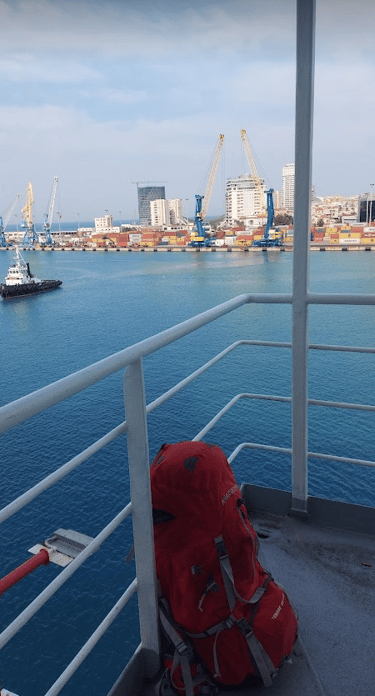... Peter English Teacher leaving a port on a ferry