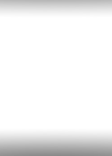 A blooming pink rose bud covered in fresh morning dew drops against a dark background.