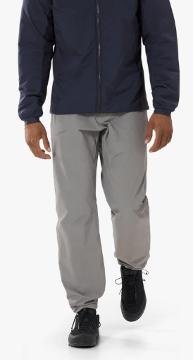 a man wearing Arc'teryx waterproof pants