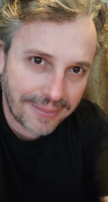 a man with a beard and a beard and a beard