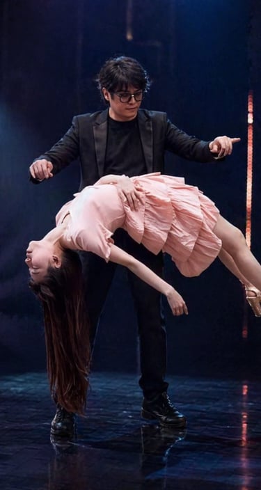 Professional magician performing a levitation illusion with an assistant on a stage with spotlights.