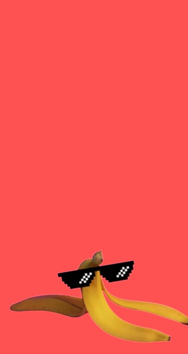 a banana peeler sitting on a pink background