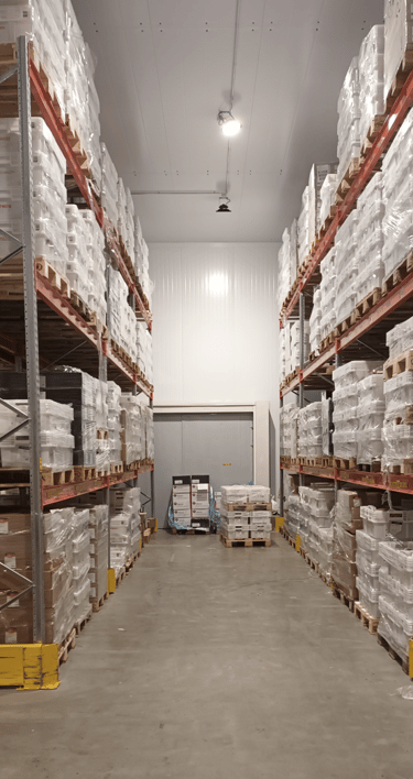 a warehouse warehouse with a lot of boxes of boxes