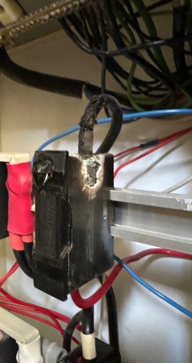 buzzy Noise from switchboard donot ignore call sparky g otherwise fuse could melt as shown in photo