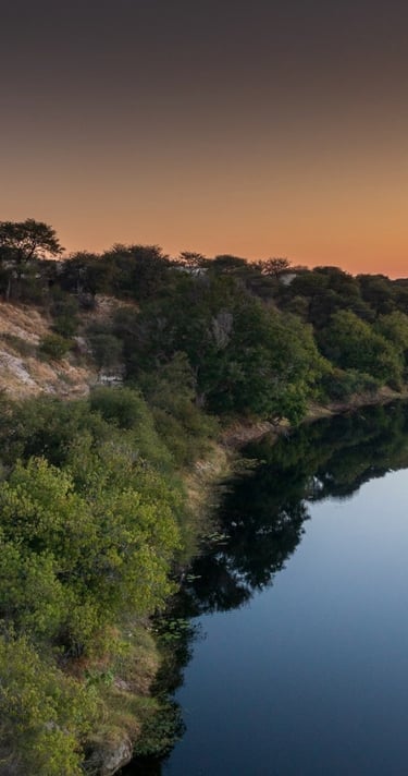 View over Meno-A-Kwena Tented Camp with the Boteti river Botswana