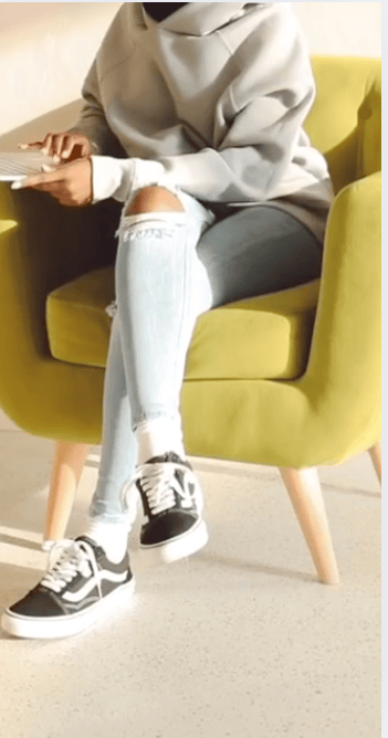 woman sitting on couch