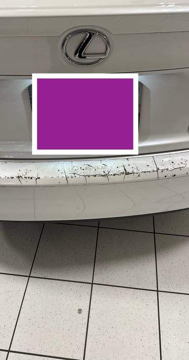 White Lexus IS bumper with damaged Paint Protection Film