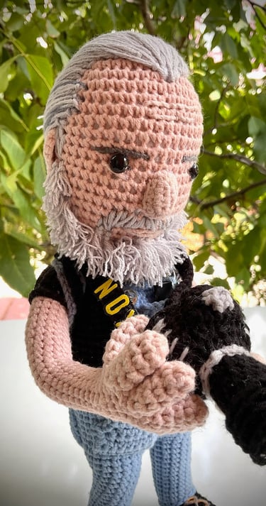 handcrafted knit photographer doll