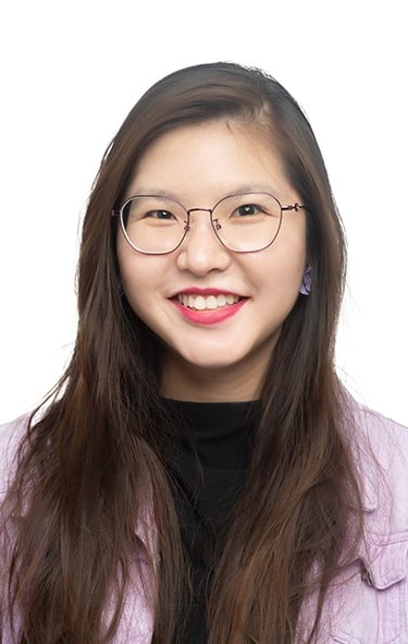 Dr Genevieve, licensed counsellor & co-founder of BAE Counselling, in her favourite colour purple