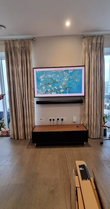 MountMyTV - Samsung Frame 55" TV & samsung soundbar mounted on a wall with cables concealed