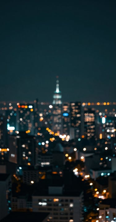 An abstract, cinematic long-exposure shot of city lights at night, dominated by deep midnight teal and muted slate blue-green tones.