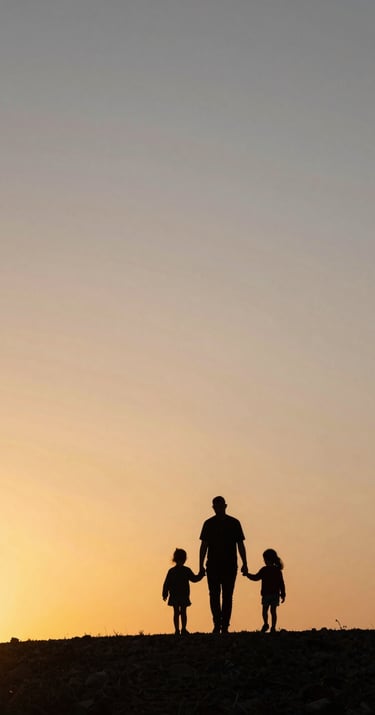Silhouettes of a family walking together on a hilltop in the Spanish countryside during a warm, sun-kissed sunset, authentic and emotional narrative.