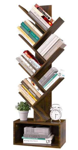 Wooden tree-shaped bookshelf filled with books and decor.
