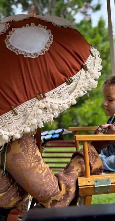 Face painting at a festival