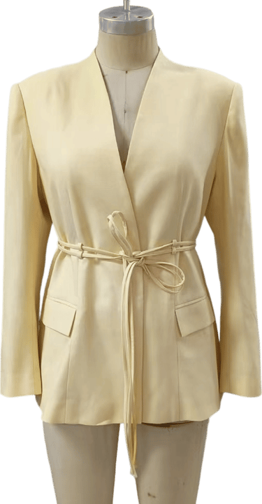 a woman's blouse with a belted belt