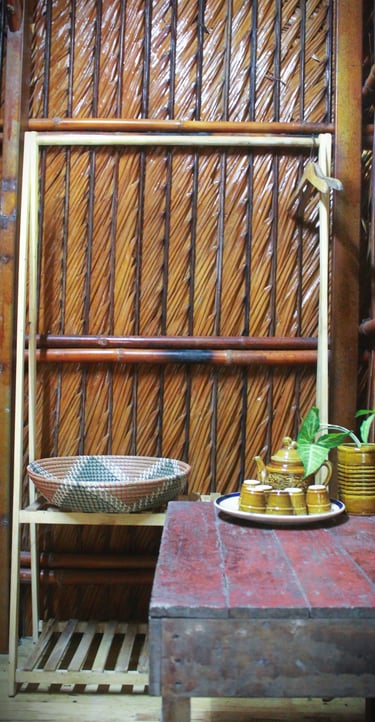 Simple yet airy room facing an open courtyard with rustic wood and nature all around.