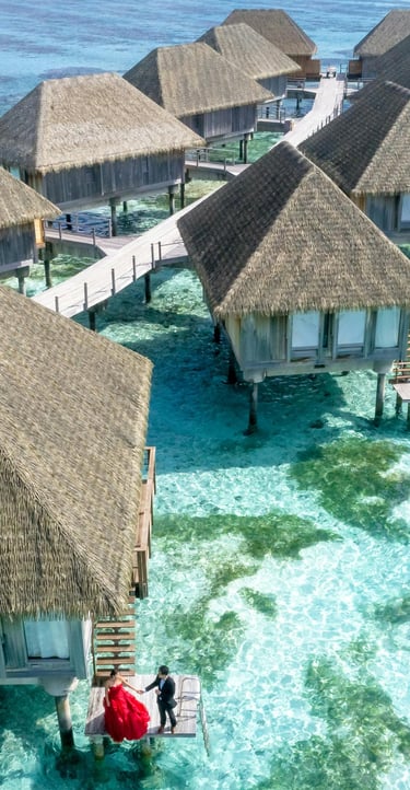 Luxury overwater villas in the Maldives surrounded by crystal-clear turquoise waters – perfect tropical island getaway