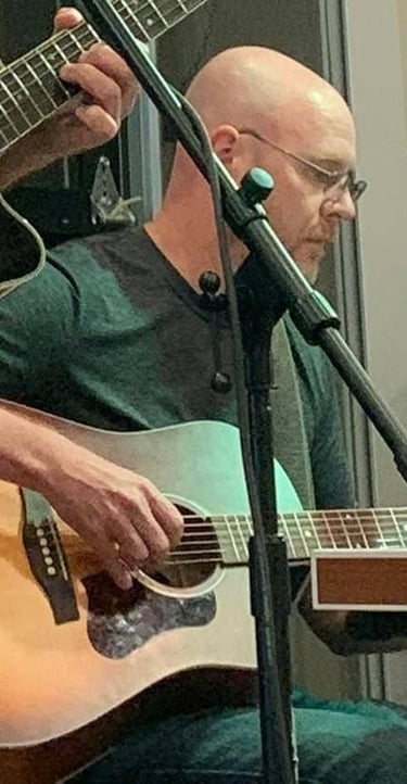 William Finn from Finn's Echo performing in front of live audience
