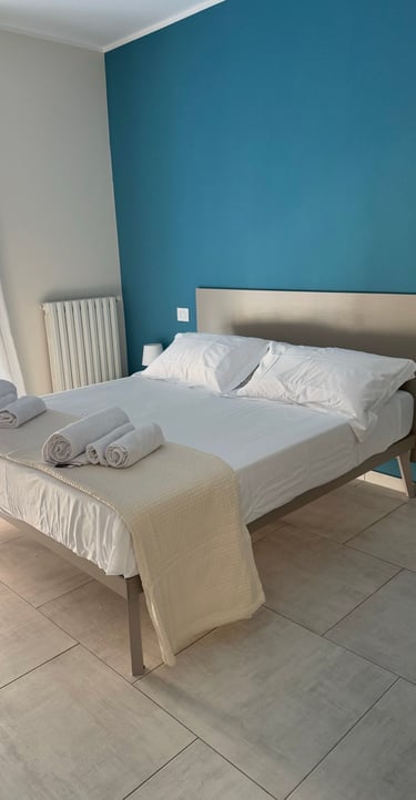 domus casa vacanze stanza da letto