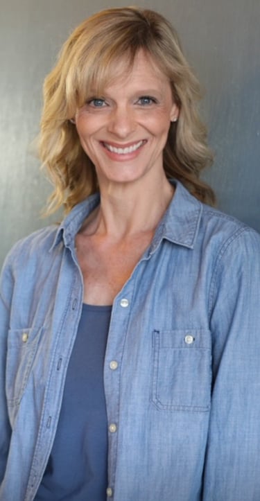 Laura in blue shirt