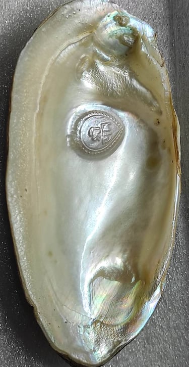 "Approx 11mm white cultured pearl featuring a divine face design–with nucleus implantation-for global shipment"