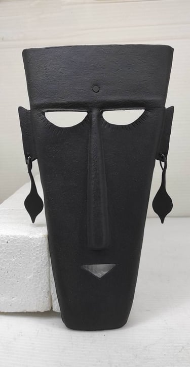 "Iron tribal mask with moon-inspired design–handmade wall accent-Globally demanded"