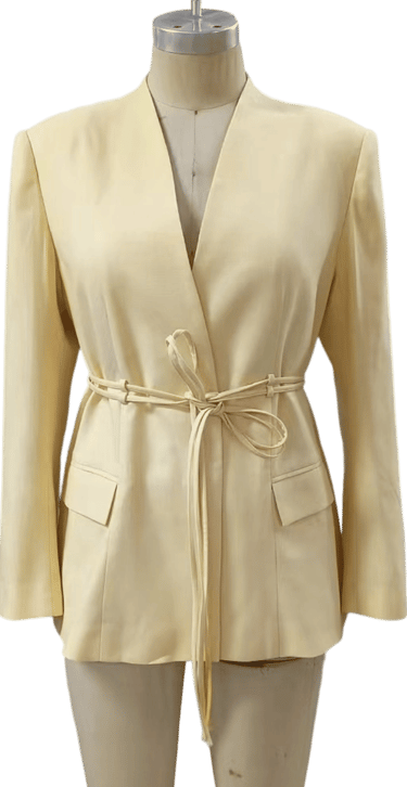 a woman's blouse with a belted belt