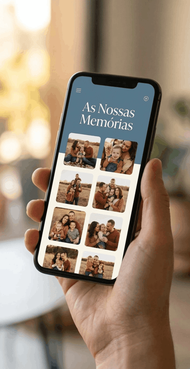 Hand holding a smartphone displaying a family photo album app titled As Nossas Memórias.