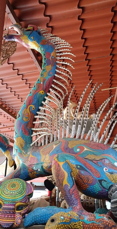 Artisan woodcrafted painted dragon near Oaxaca