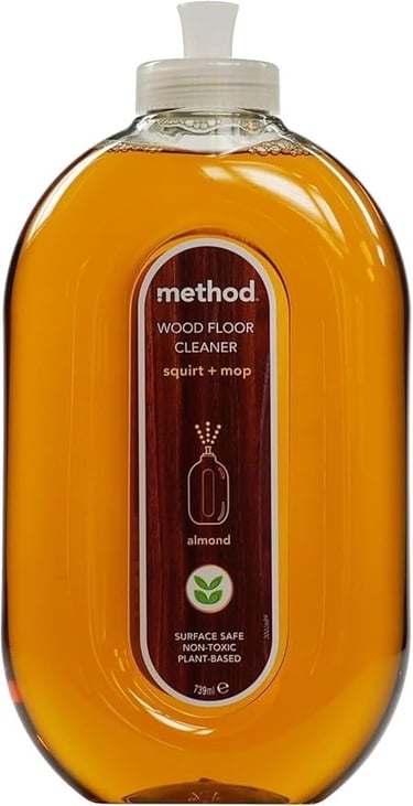 a bottle of wood floor cleaner with a bottle of wood
