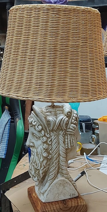 Two faced Janus table lamp.
