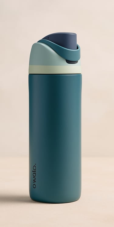 Teal reusable water bottle with flip-top lid on a beige background.