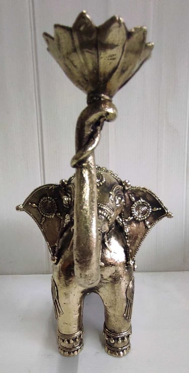 "Handcrafted brass elephant holding lotus flower in raised trunk, front side-Export-grade"