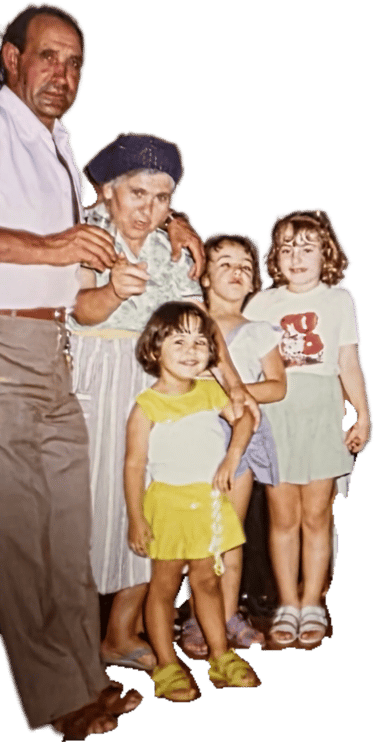 a man and two children posing for a family photo