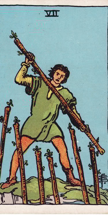 Seven of Wands tarot card – defense, challenge, standing firm.