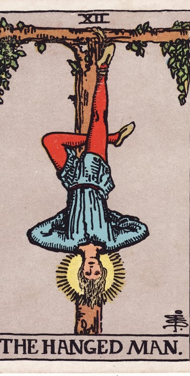 The Hanged Man tarot card meaning – surrender, new perspective, and letting go.