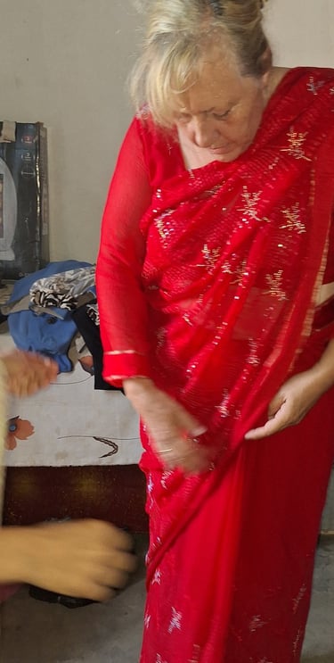 learning to wear a sari in Thakurdwara