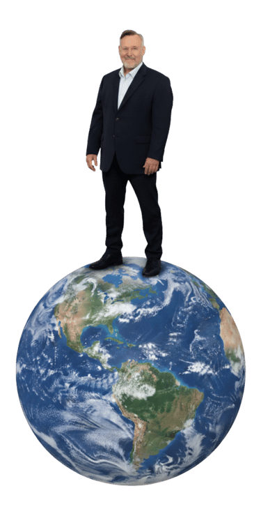 gary k standing on top of the world