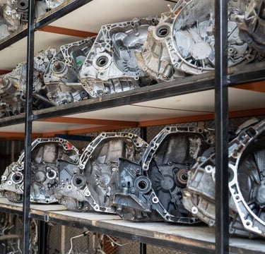 a bunch of car parts sitting on shelves