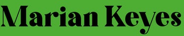 a person standing in front of a green background