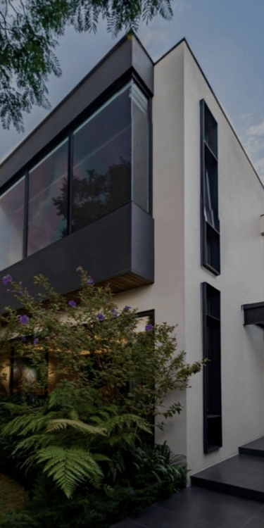 a modern house with a large glass window
